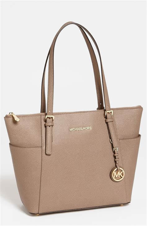 bolsa jet set michael kors|michael kors jet collection.